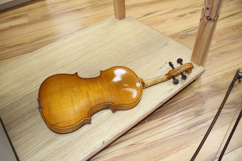 A Chinese violin and four bows